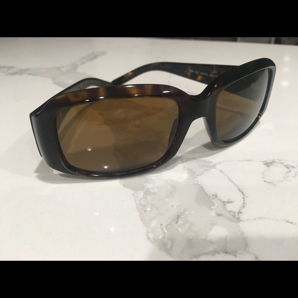 Never worn Prada polarized men’s sunglasses.